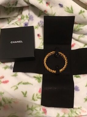 Authentic vintage CHANEL Twisted Rope Bangle in Gold Tone circa early 1990’s